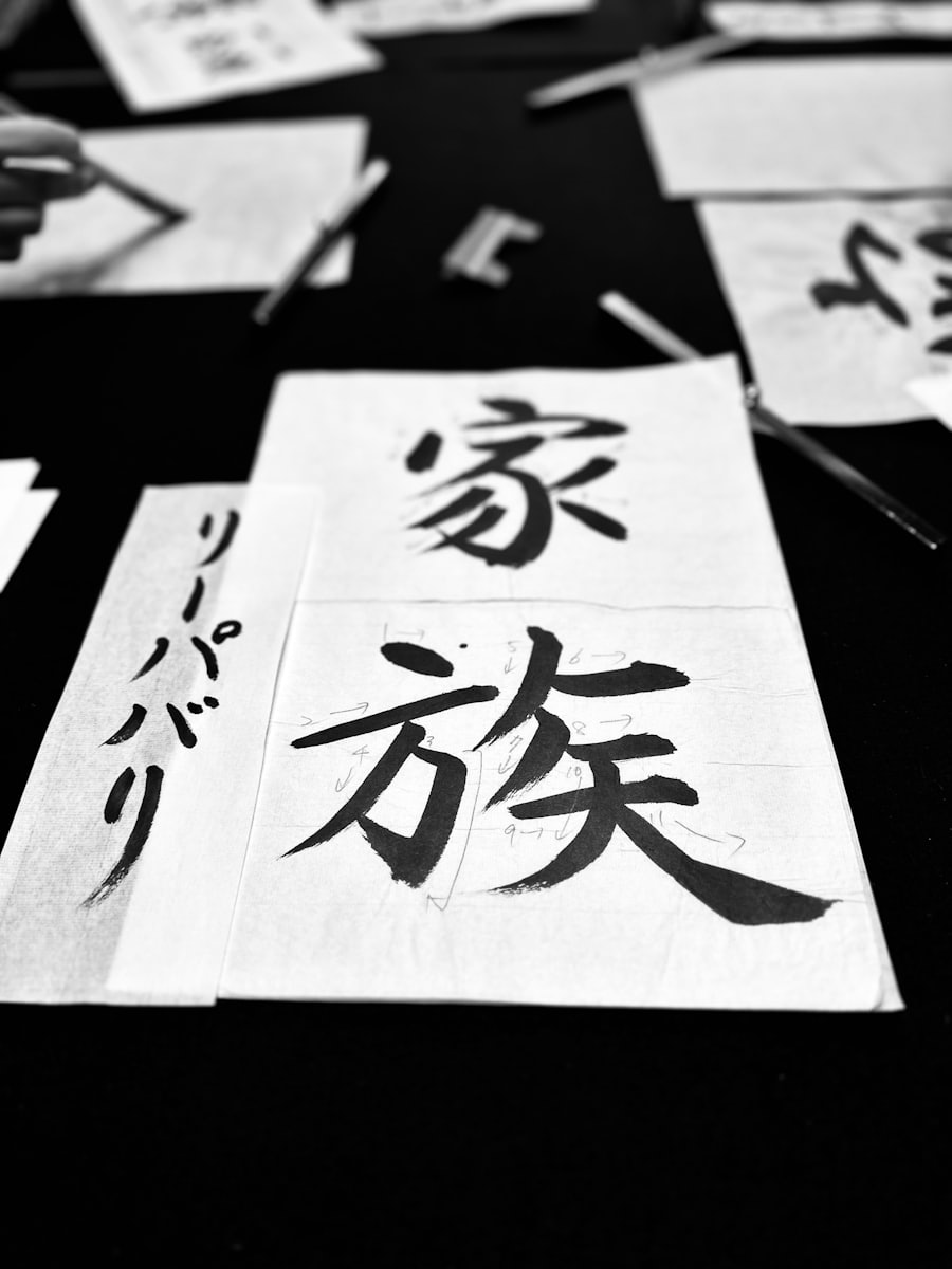 Japanese calligraphy sheets laid out on a table